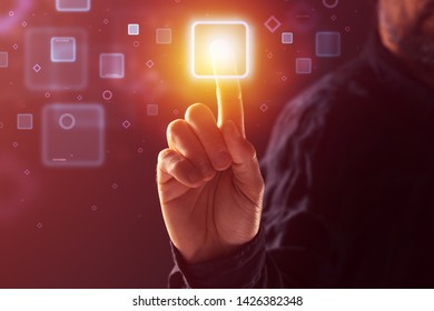 Touchscreen interface concept, man pushing virtual screen menu button