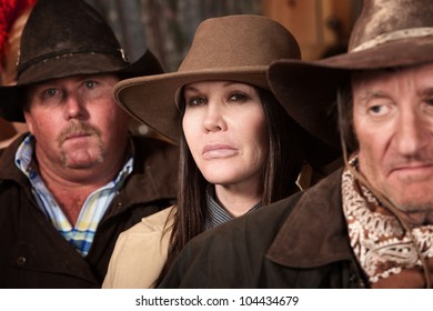 Tough Cowgirl Between Two Men People In Crowded Old Western Bar