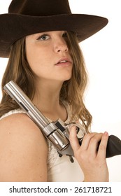 Tough Cowgirl Holding Large Pistol Glaring Forward