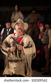 Tough Old West Frontiersman With Weapons Drawn