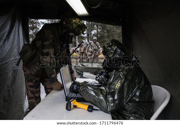 TOULOUSE, FRANCE - FEBRUARY 11: simulation of a Nuclear\
Biological and Chemical Warfare (Nbc) during the training of French\
paratroopers in south of France before going to war in Africa, for\
Barkhane 