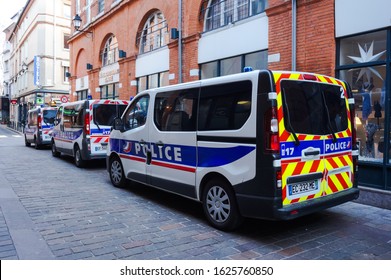 Toulouse, France - Jan. 2020 - Convoy Of Renault Trafic Minibuses Of The French National Police, With Reflective Tape On The Rear, In Porte Sardane Street During Protests Against The Pension Reform