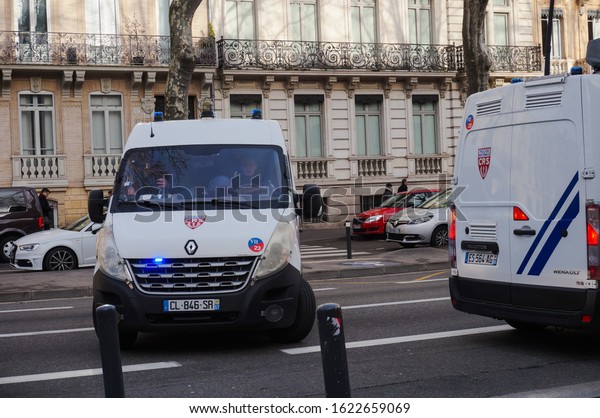 Toulouse, France - Jan. 2020 - Police van\
(Renault Master) of the riot units of the National Police (CRS), in\
reverse movement during a demonstration against the pension reform\
in Strasbourg\
Boulevard