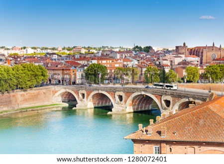 Toulouse and Pont Neuf bridge across Garonne river