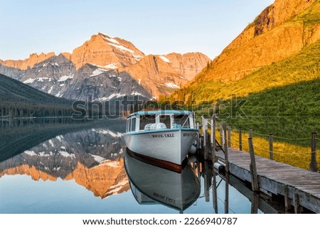 Tour  boat  in Josephine Lake, Glacier National Park, Montana, USA