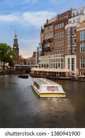 Tour Boat On Canal In Amsterdam
