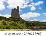 Tour de la Hougue, built by Vauban, from the beach of the Cul-de-Loup bay in Saint-Vaast-la-Hougue