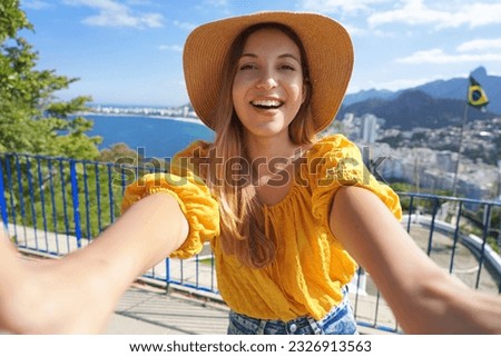 Tourism in Brazil. Fashion tourist woman takes selfie photo in Rio de Janeiro, Brazil.