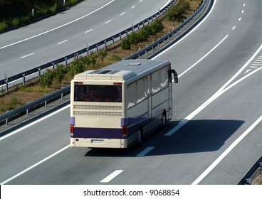 Tourism bus traveling fast on highway