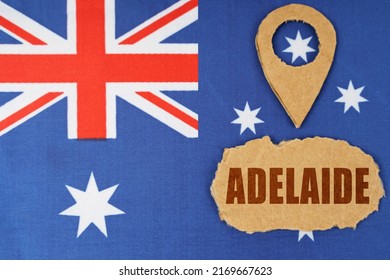 Tourism And Industry Concept. The Flag Of Australia Has A Geolocation Symbol And A Sign With The Inscription - Adelaide