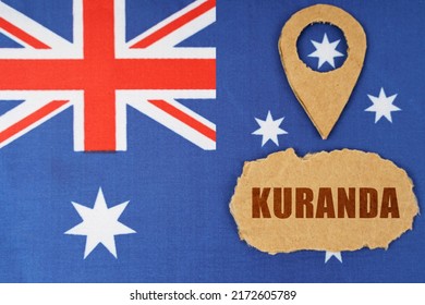 Tourism And Industry Concept. The Flag Of Australia Has A Geolocation Symbol And A Sign With The Inscription - Kuranda