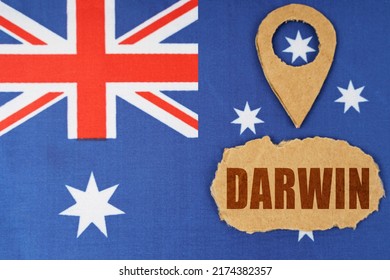 Tourism And Industry Concept. The Flag Of Australia Has A Geolocation Symbol And A Sign With The Inscription - Darwin