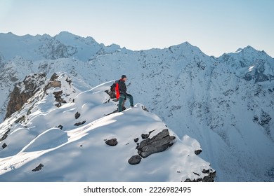 Tourist with a backpack and mountain panorama. Mountains with mount Everest, Earth's highest mountain. Travel sport lifestyle concept - Powered by Shutterstock