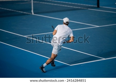 Tourist with backpacks in a crowd watching a sporting event in a stadium. Sports fans cheering and watching tennis at the Australian open in Australia. Hot summer sport fans, wearing 