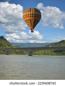 Tourist balloons, balloons floating over the Mekong River in Lao PDR, balloons floating in a beautiful blue sky, balloon group, focus in the upper left corner of the  image, focus in the upper right  - Shutterstock ID 2239608765