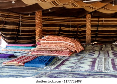 Tourist Bedouin Tent With Multi-colored Mats In A Night Camp