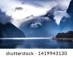 tourist boat cruising in milford sound fjordland national park