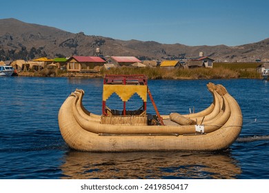 Tourist boats made of reed moored at Uros Islands, Lake Titicaca, Peru