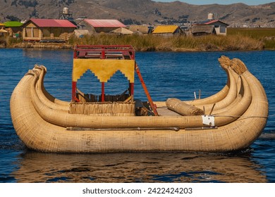Tourist boats made of reed moored at Uros Islands, Lake Titicaca, Peru