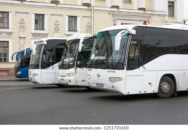 Tourist buses on\
parking in the historical part of the city. Russia.\
Saint-Petersburg. 09 October\
2018