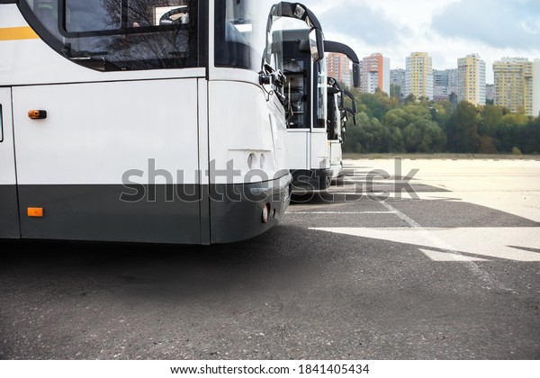 Tourist\
Buses Parking at the Bus Station on a Sunny\
Day