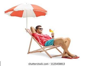 Tourist With A Cocktail Sitting In A Deck Chair With An Umbrella Isolated On White Background