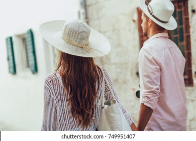 Tourist Couple Enjoying Sightseeing And Exploring City