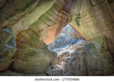 A Tourist Is Enjoying The Atmosphere In A Goa Suci Located In Tuban Regency, Indonesia On Saturday, July 11, 2020