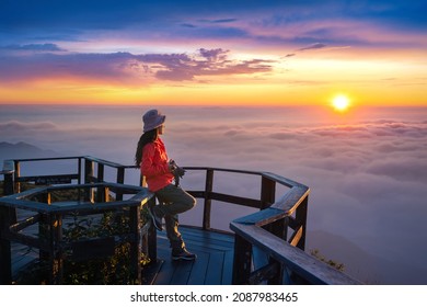 Tourist enjoying sunset at Kew Mae Pan viewpoint in Doi inthanon, Chiang Mai, Thailand.