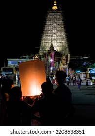 Tourist Family Touch And Pray Floating Lamp , Sky Lantern On Bodh Gaya Temple In Sangkhlaburi , Kanchanaburi , Thailand. On September 10,2022