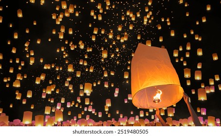 Tourist floating sky lanterns in Loy Krathong festival , Chiang Mai ,Thailand. - Powered by Shutterstock