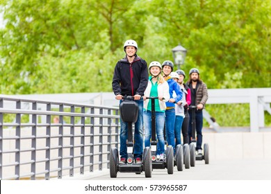 Tourist group having guided Segway city tour in Germany