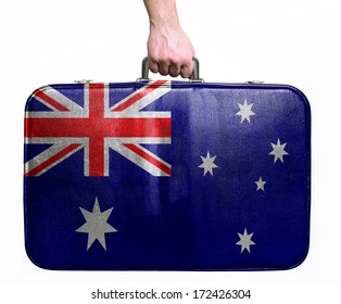 Tourist Hand Holding Vintage Leather Travel Bag With Flag Of Australia