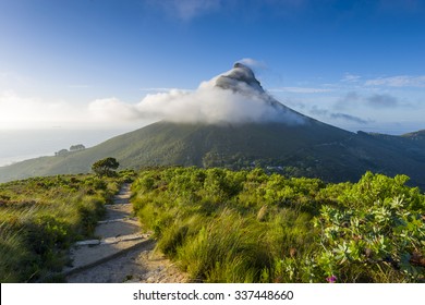 Tourist hikers up Cape Town, Table Mountain landscape, overlooking Lions Head peak - Powered by Shutterstock