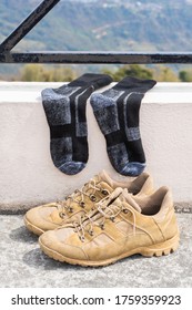 Tourist Hiking Shoes With Socks. Trekking And Hiking, Travel And Tourism Concept. Close-up Stock Photo.