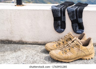 Tourist Hiking Shoes With Socks. Trekking And Hiking, Travel And Tourism Concept. Close-up Stock Photo.