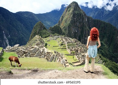 Tourist At Historic Lost City Of Machu Picchu - Peru