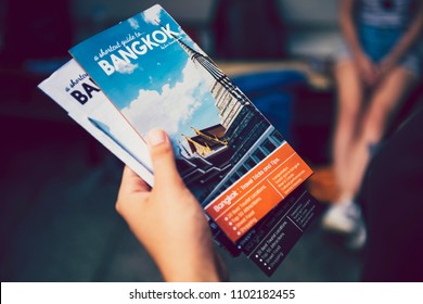 Tourist Holding Bangkok Travel Guide Brochures