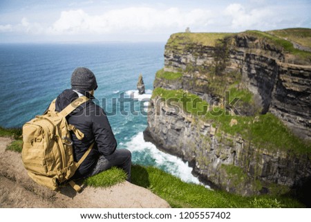 Similar – Image, Stock Photo Cliffs of Moher, woman, hiking