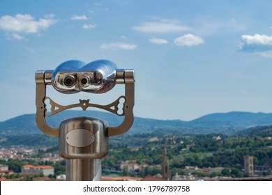 Tourist Sightseeing Binoculars viewing Florence, Italy