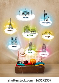 Tourist Suitcase With Famous Landmarks Around The World On Grungy Background