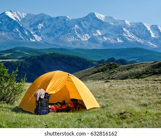 tourist tent camping in mountains - Shutterstock ID 632816162