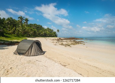 Tourist Tent Camping On Sand Beach