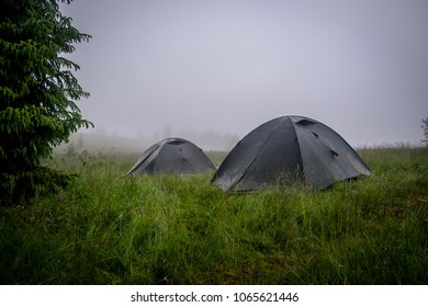 Tourist Tent Camping In The Rain In Mountains. Ukrainian Carpathians.