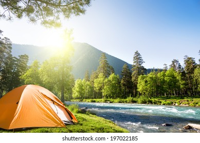 tourist tent in forest camp
