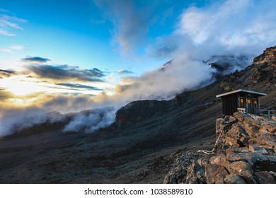 Tourist Toilets At Summit Base Camp Of Mount Kilimanjaro At Sunset, Africa