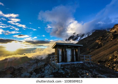 Tourist Toilets At Summit Base Camp Of Mount Kilimanjaro At Sunset, Africa