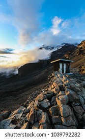 Tourist Toilets At Summit Base Camp Of Mount Kilimanjaro At Sunset, Africa