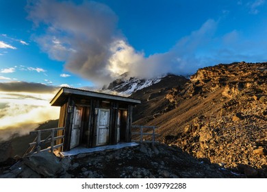 Tourist Toilets At Summit Base Camp Of Mount Kilimanjaro At Sunset, Africa