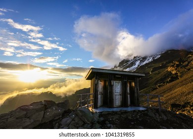 Tourist Toilets At Summit Base Camp Of Mount Kilimanjaro At Sunset, Africa